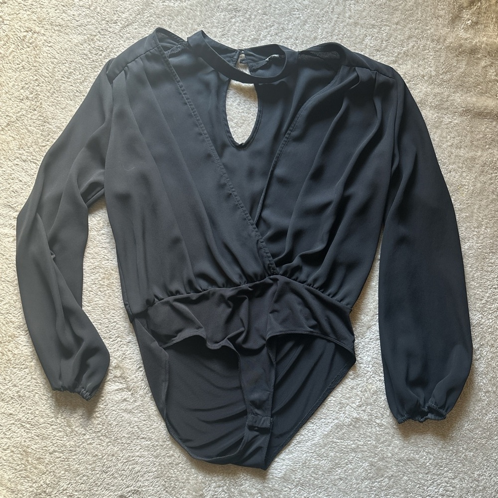 Black long sleeve bodysuit with plunge neck and choker detail